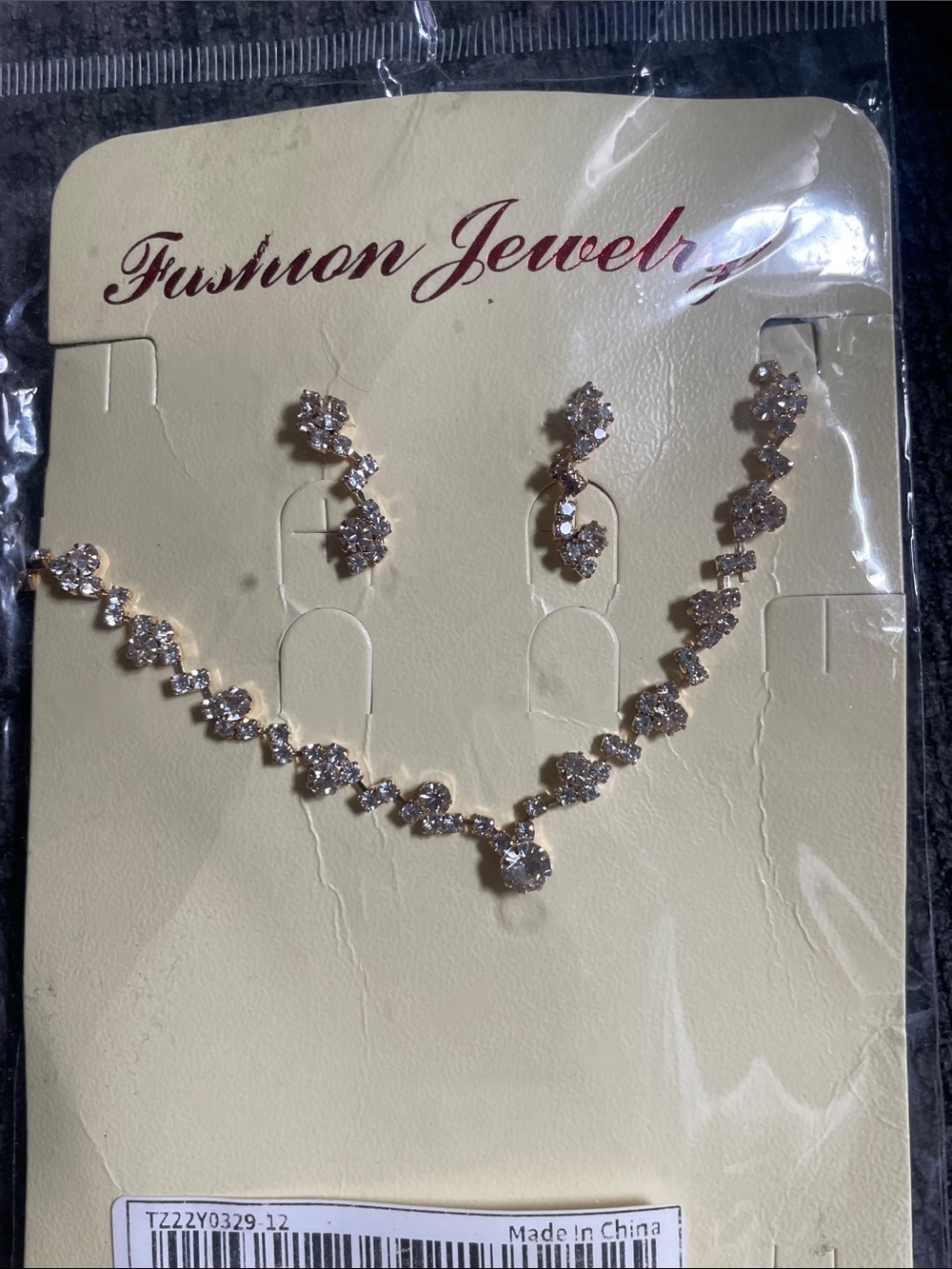 Fashion Jewelry Gold and Clear Crystal Necklace with Matching Drop Earrings